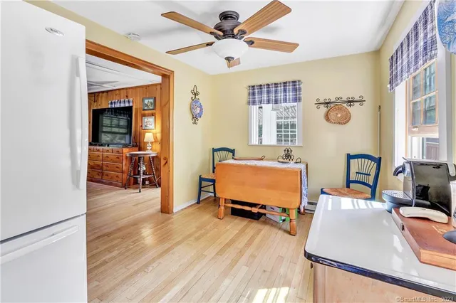 a bedroom with furniture and a window