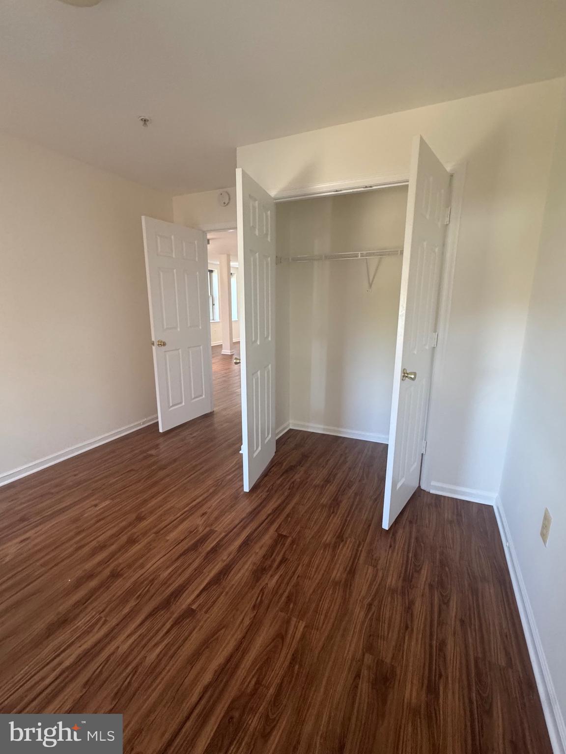 1210 Perry Street Northeast, Unit 202 Washington, DC 20017 - Photo 19 of 30 wooden floor in an empty room