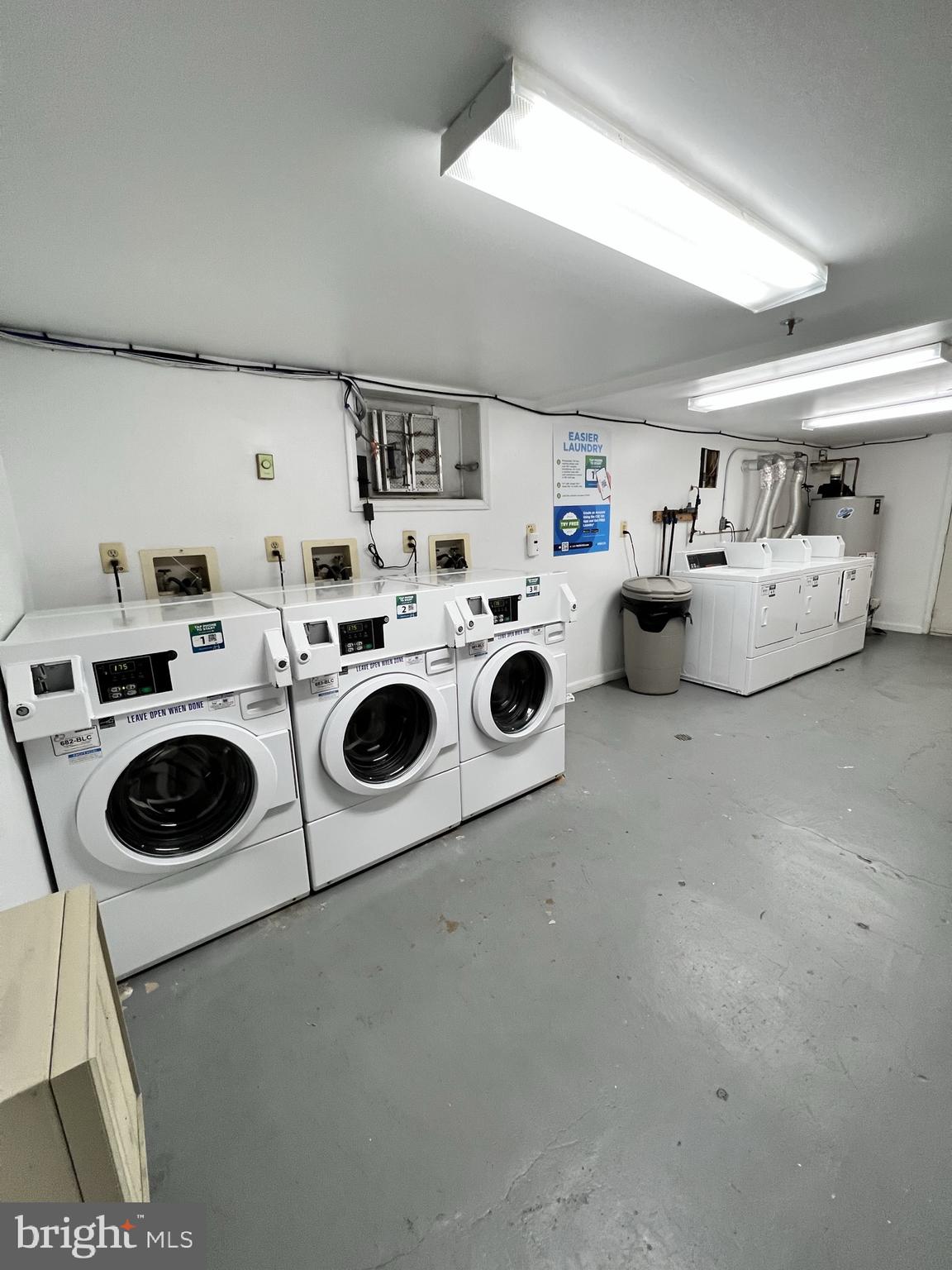 1210 Perry Street Northeast, Unit 202 Washington, DC 20017 - Photo 26 of 30 a utility room with dryer and washer