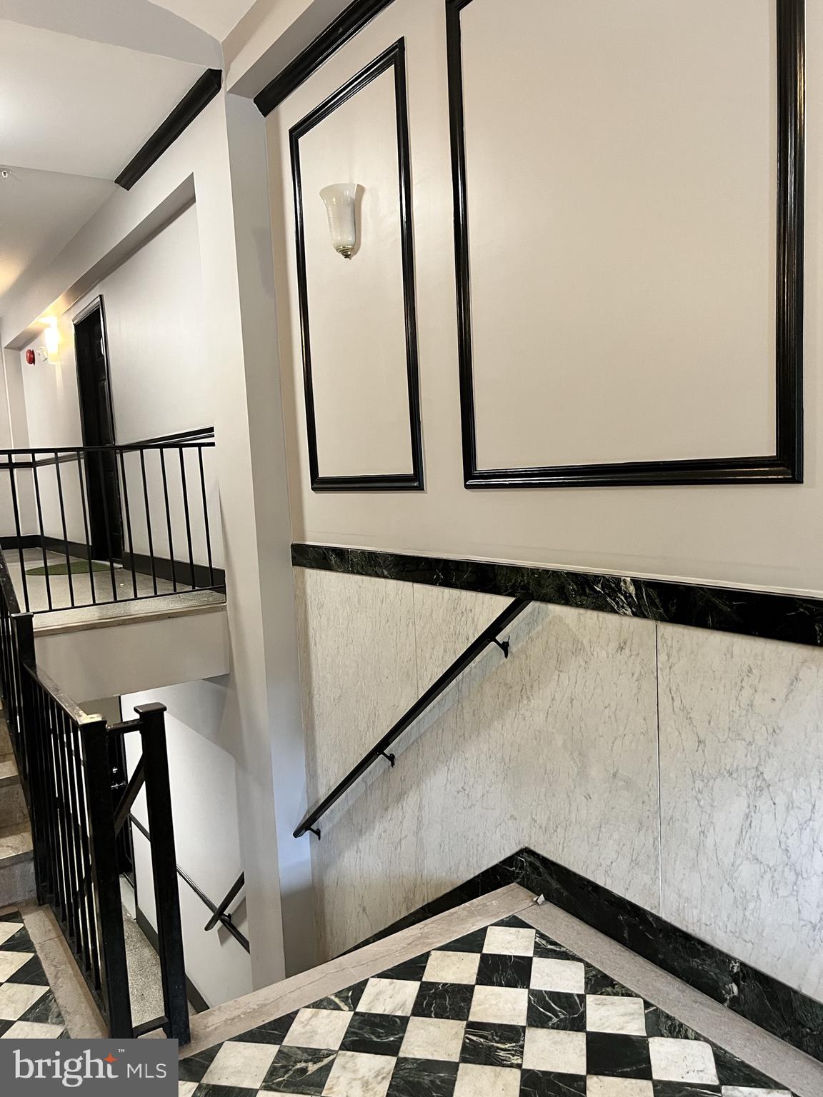 1210 Perry Street Northeast, Unit 202 Washington, DC 20017 - Photo 4 of 30 a view of staircase with a rug