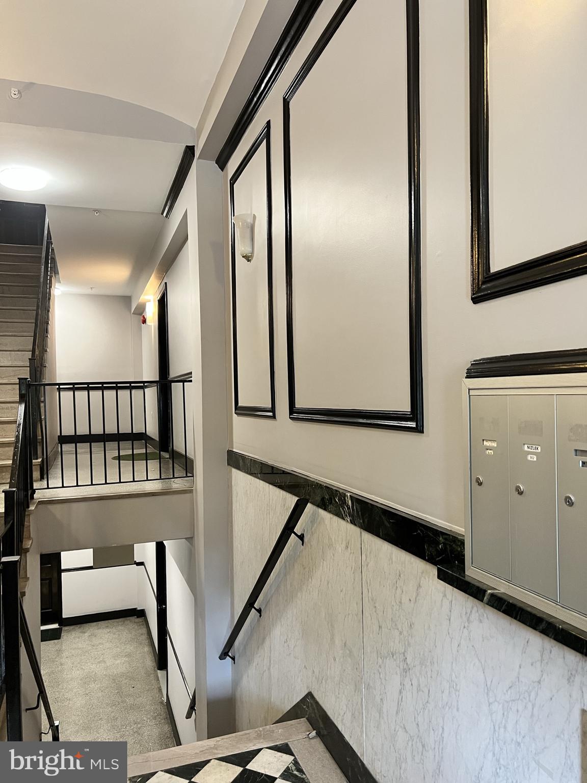 1210 Perry Street Northeast, Unit 202 Washington, DC 20017 - Photo 5 of 30 a view of a hallway with staircase