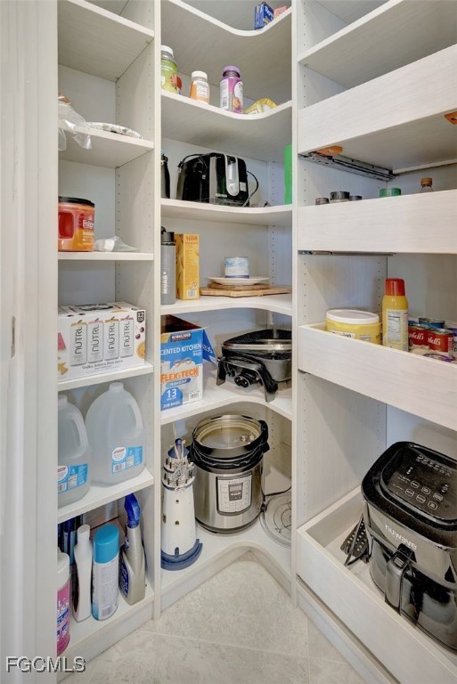 11812 Clifton Terrace Fort Myers, FL 33913 - Photo 13 of 46 a kitchen with a stove and cabinets