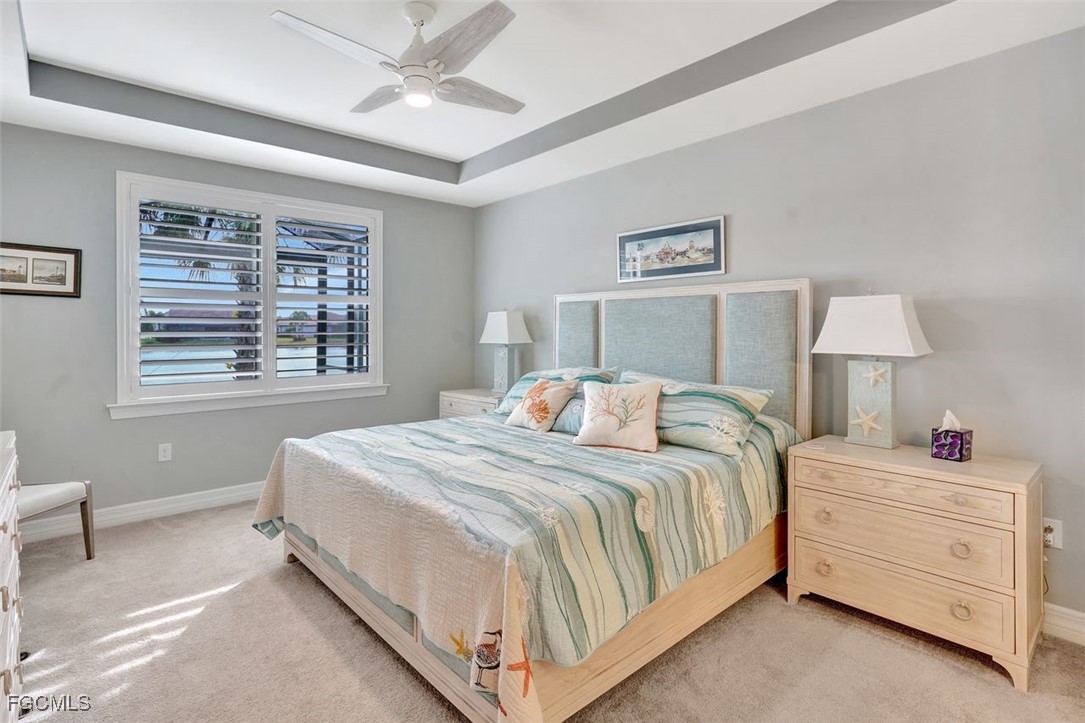 11812 Clifton Terrace Fort Myers, FL 33913 - Photo 21 of 46 a bedroom with a large bed and a window