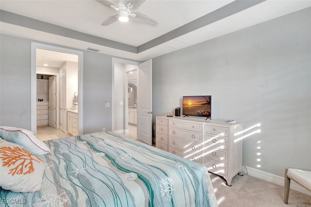 11812 Clifton Terrace Fort Myers, FL 33913 - Photo 23 of 46 a bedroom with a bed and a television