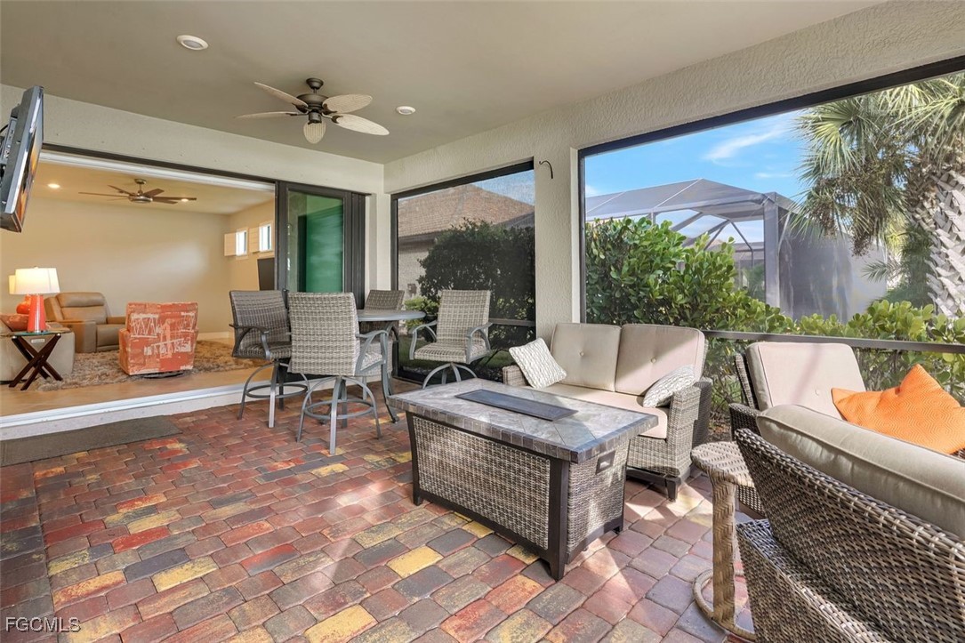 11812 Clifton Terrace Fort Myers, FL 33913 - Photo 27 of 46 a living room with furniture and a large window