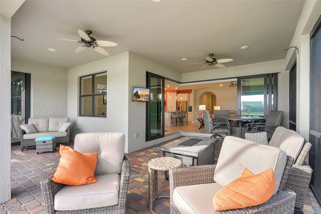 11812 Clifton Terrace Fort Myers, FL 33913 - Photo 28 of 46 a living room with furniture and a large window