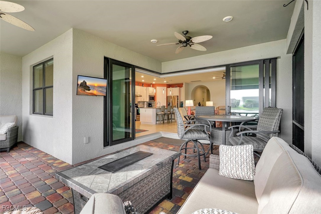 11812 Clifton Terrace Fort Myers, FL 33913 - Photo 29 of 46 a living room with furniture and a large window