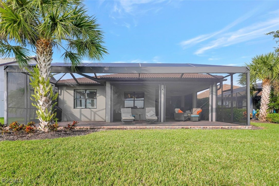 11812 Clifton Terrace Fort Myers, FL 33913 - Photo 37 of 46 a front view of house with yard