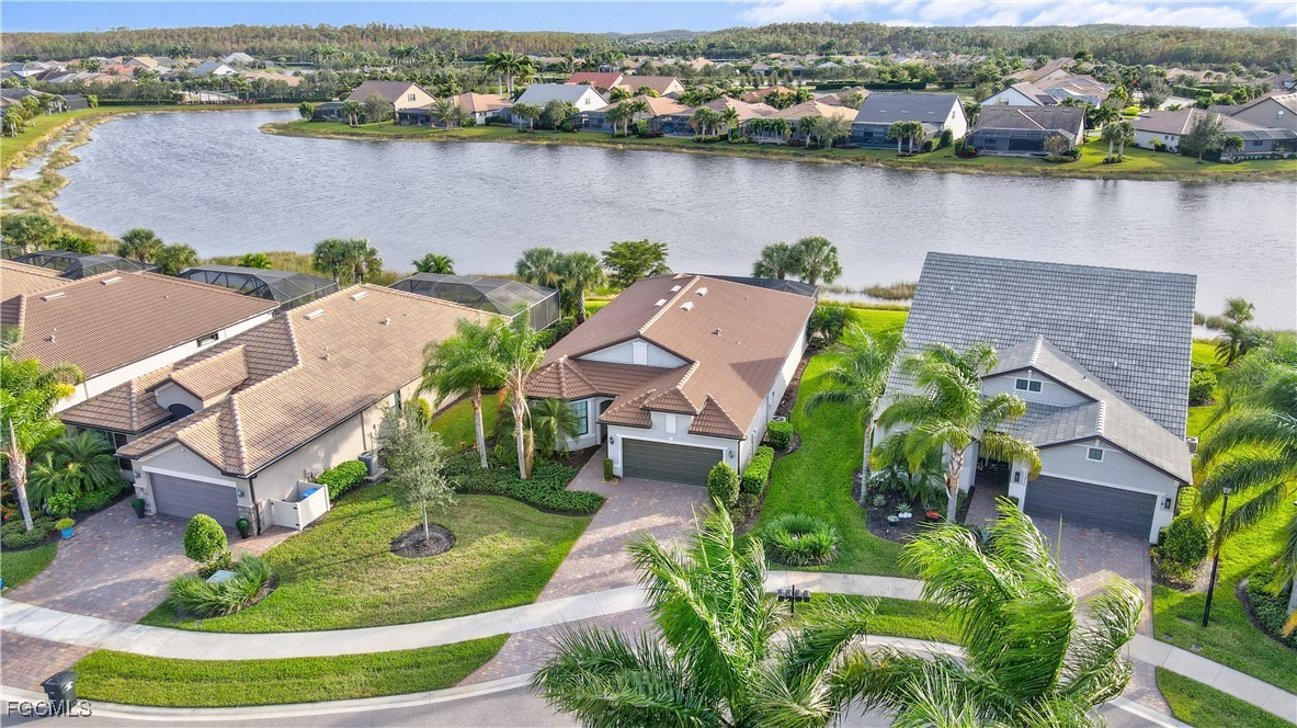11812 Clifton Terrace Fort Myers, FL 33913 - Photo 38 of 46 an aerial view of a house with a lake view