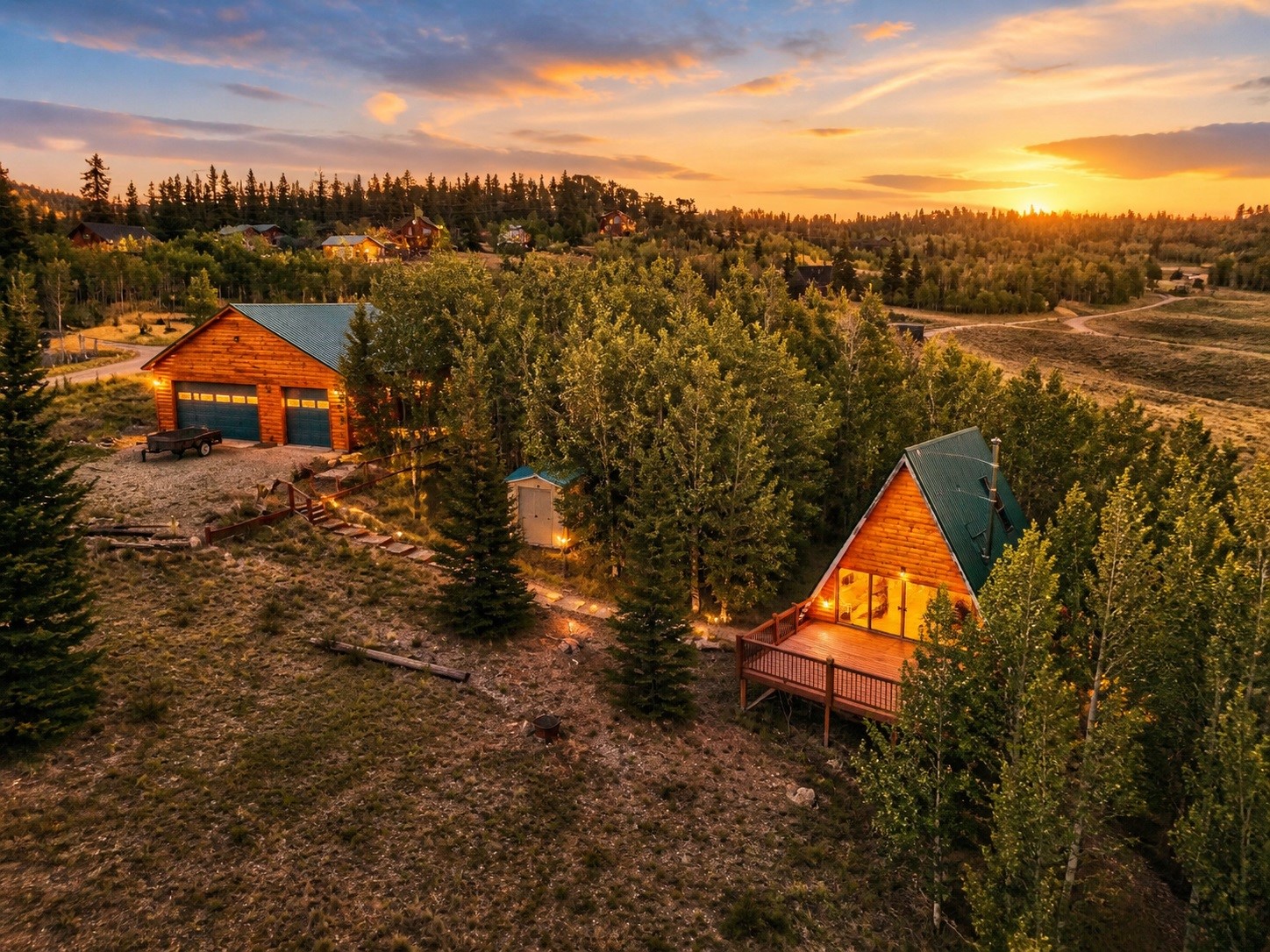 567 Haida Road Como, CO 80456 - Photo 1 of 41 an aerial view of a house with a lake view