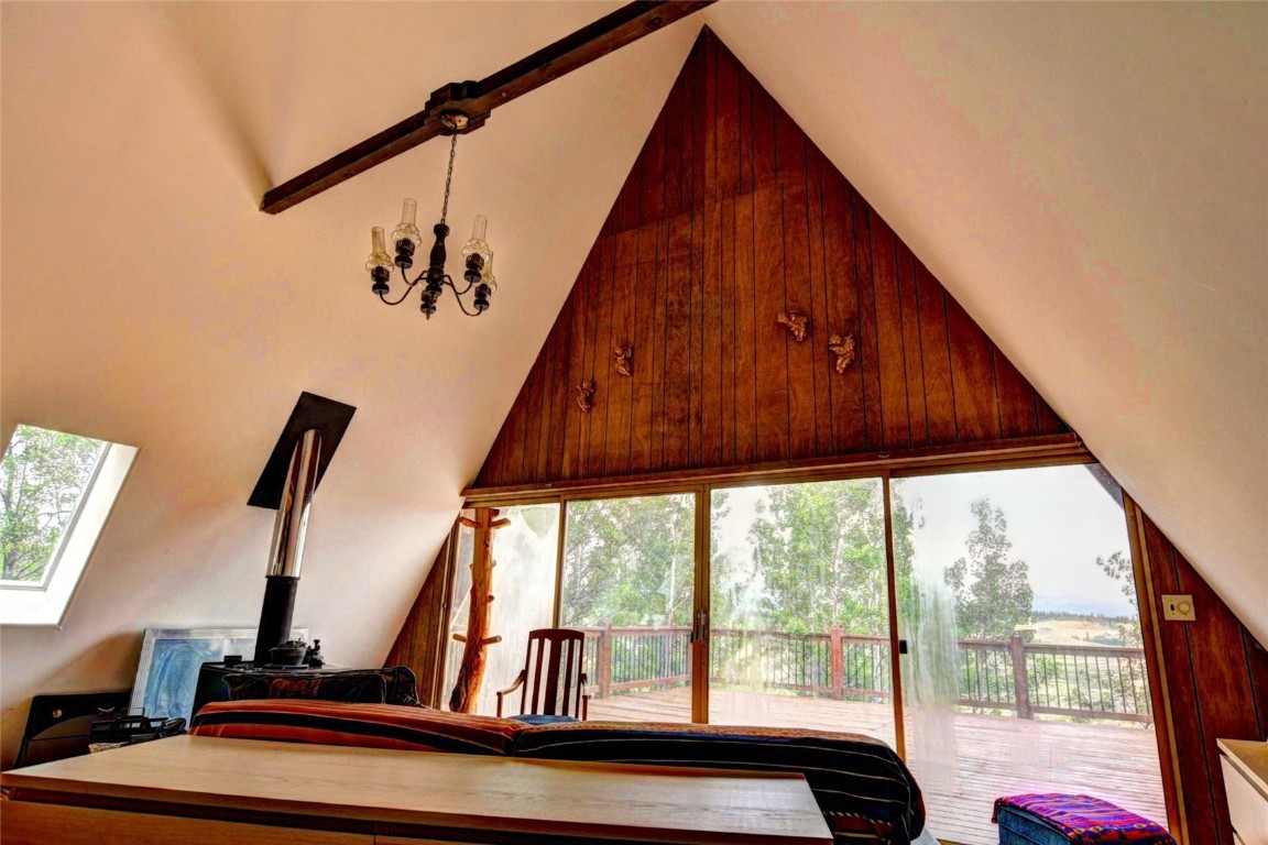 567 Haida Road Como, CO 80456 - Photo 14 of 50 a view of a balcony with furniture and floor to ceiling windows