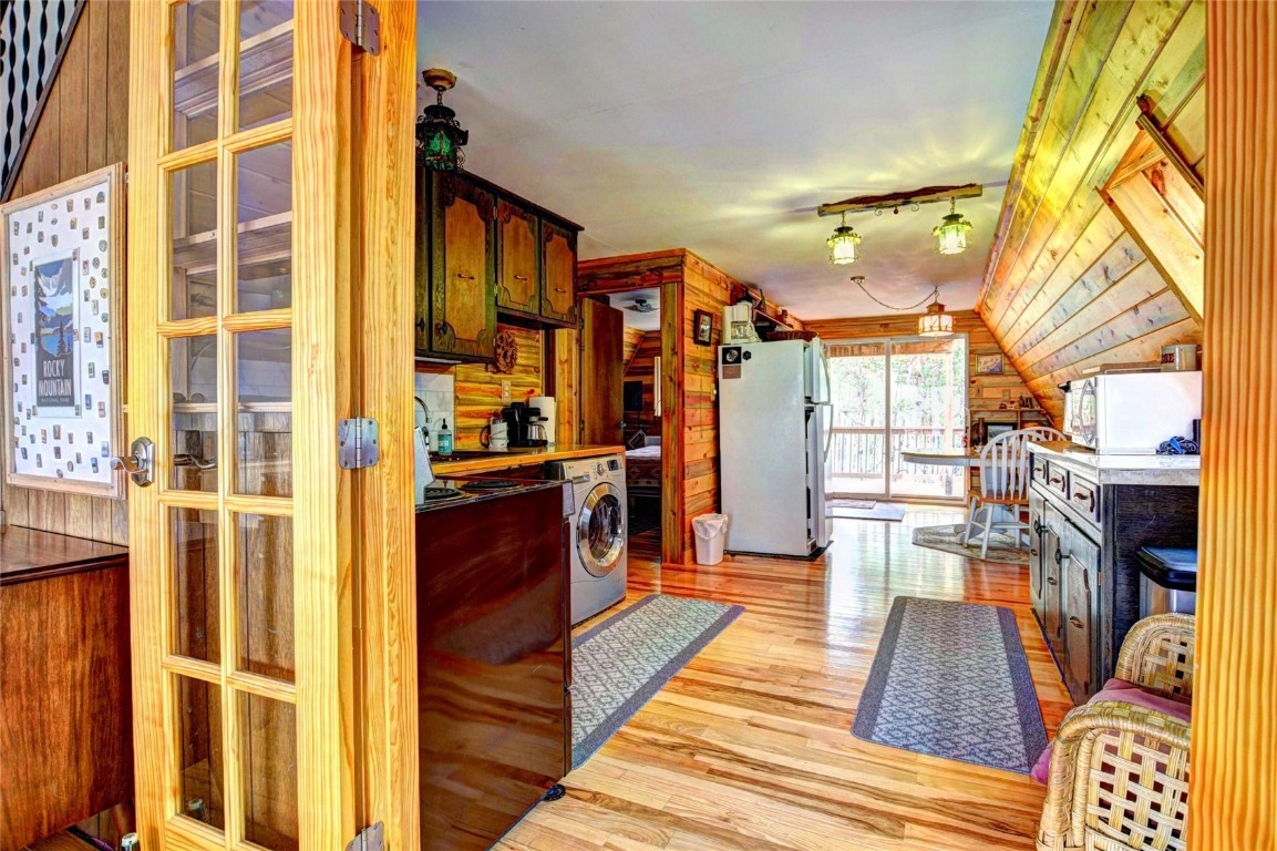 567 Haida Road Como, CO 80456 - Photo 21 of 50 a narrow alley way with furniture and wooden floor