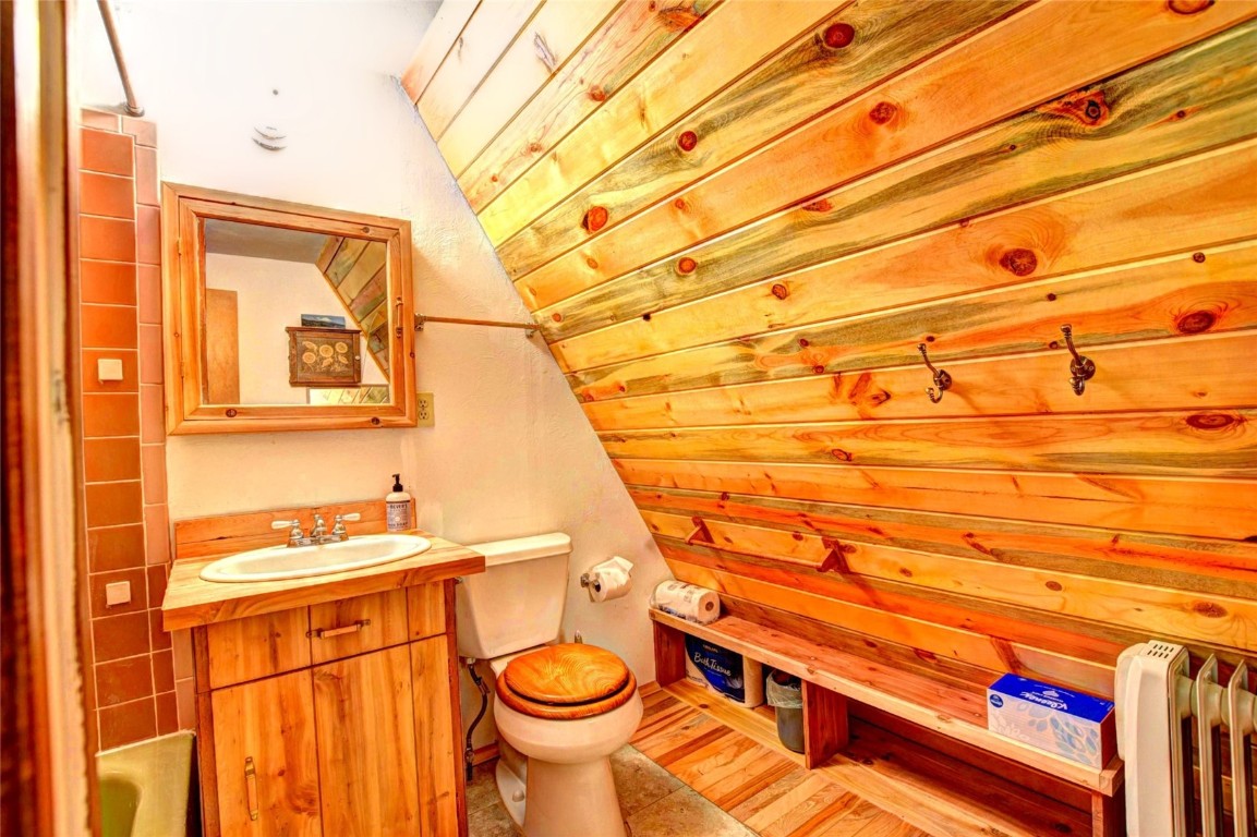 567 Haida Road Como, CO 80456 - Photo 32 of 50 a bathroom with a sink and mirror