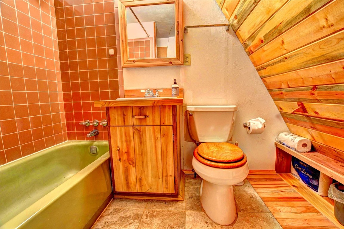 567 Haida Road Como, CO 80456 - Photo 33 of 50 a bathroom with a sink and bathtub