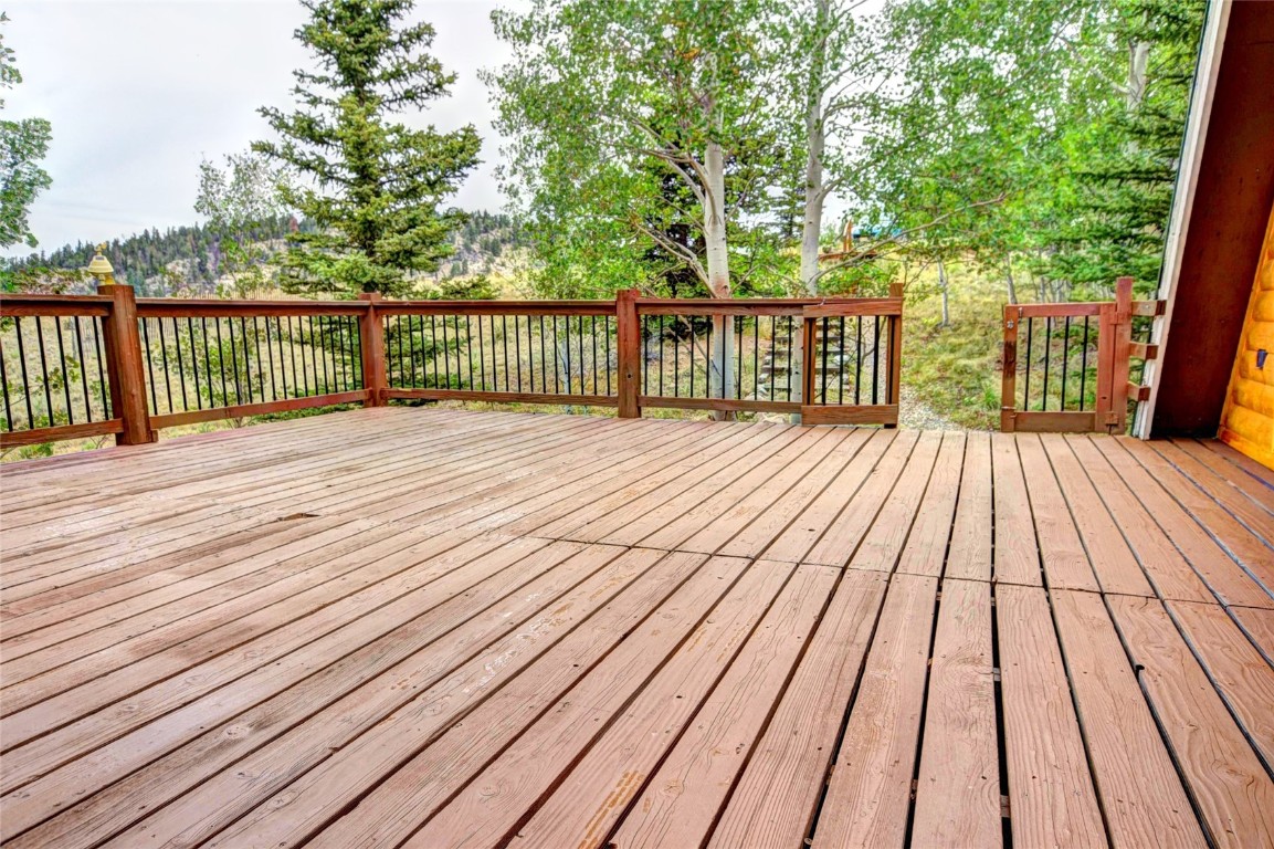 567 Haida Road Como, CO 80456 - Photo 36 of 50 a view of backyard with wooden floor and fence