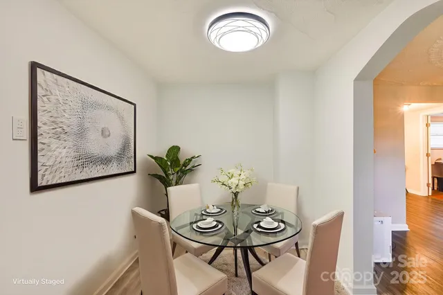 a kitchen with granite countertop a sink cabinets and window