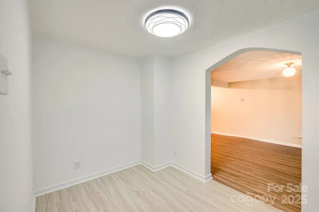 a kitchen with stainless steel appliances granite countertop a refrigerator sink and stove
