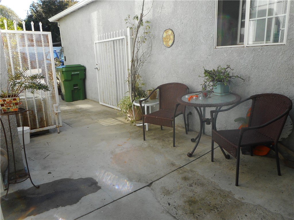 4267 Van Nuys Boulevard Sherman Oaks, CA 91403 - Photo 17 of 17 a backyard of a house with barbeque oven table and chairs
