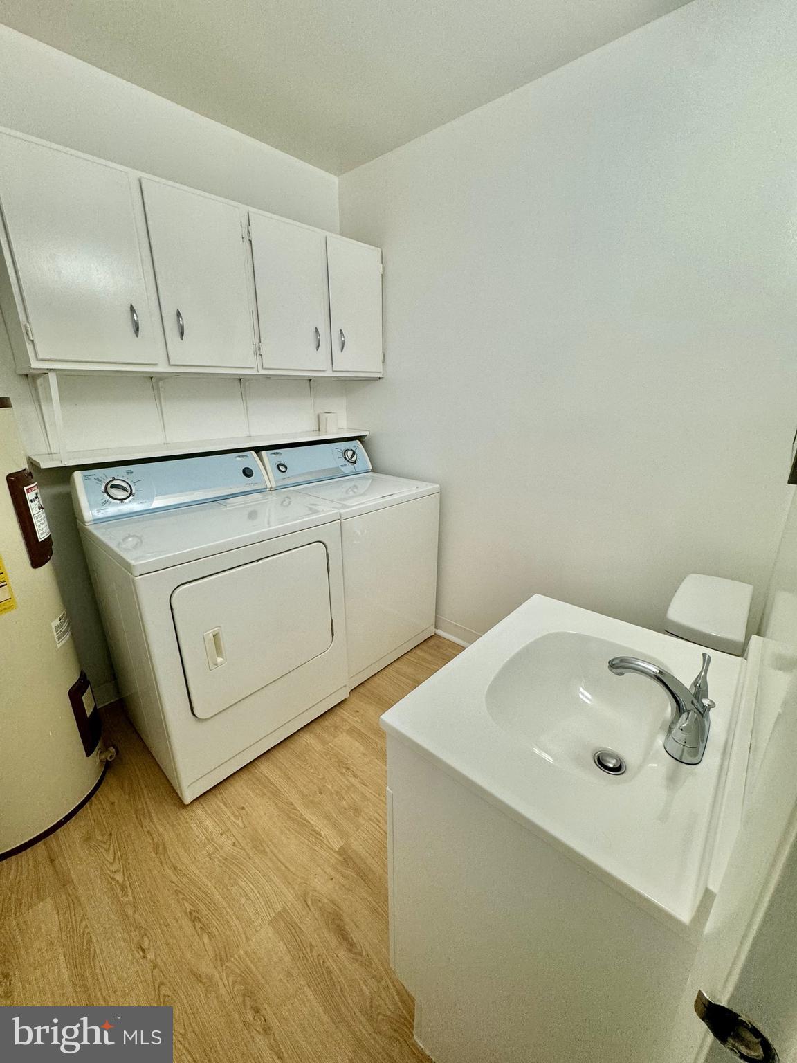 11412 Turnmill Lane Reston, VA 20191 - Photo 18 of 23 Half bath and utilities