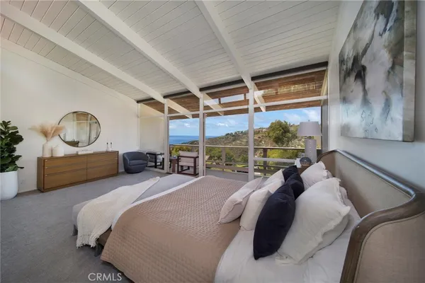 a bed room with a bed and window