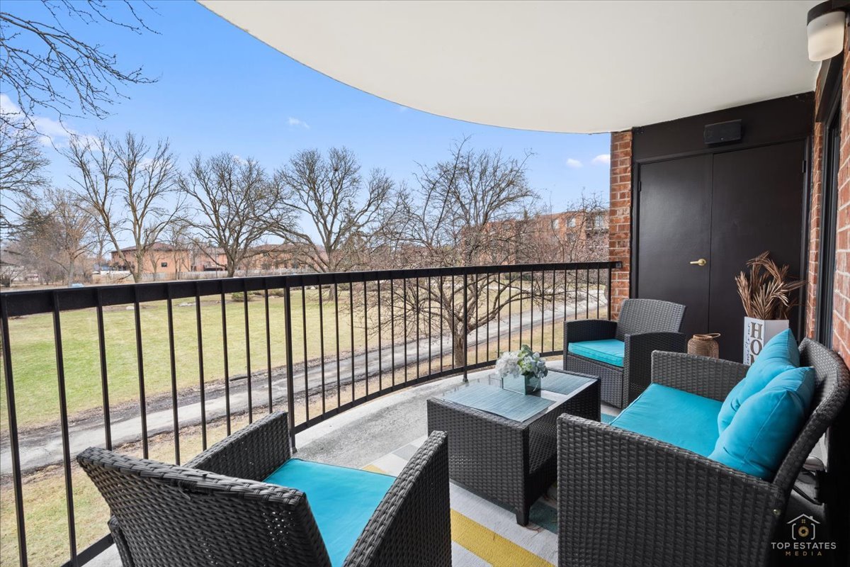1405 East Central Road, Unit 222C Arlington Heights, IL 60005 - Photo 30 of 45 a outdoor living room with furniture