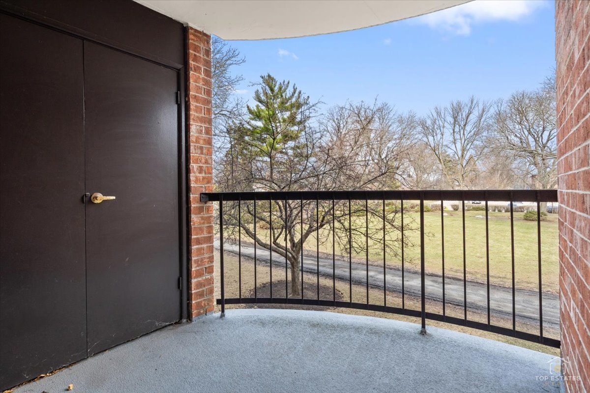 1405 East Central Road, Unit 222C Arlington Heights, IL 60005 - Photo 31 of 45 a view of a room with a large window
