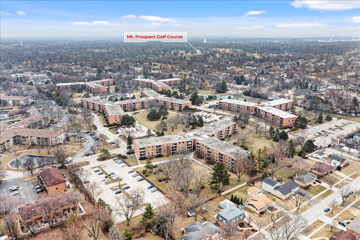 1405 East Central Road, Unit 222C Arlington Heights, IL 60005 - Photo 37 of 45 an aerial view of residential building with parking space
