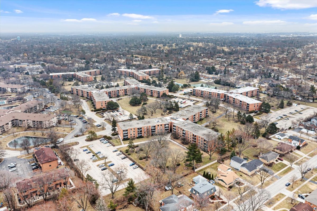 1405 East Central Road, Unit 222C Arlington Heights, IL 60005 - Photo 39 of 45 an aerial view of residential building with parking space