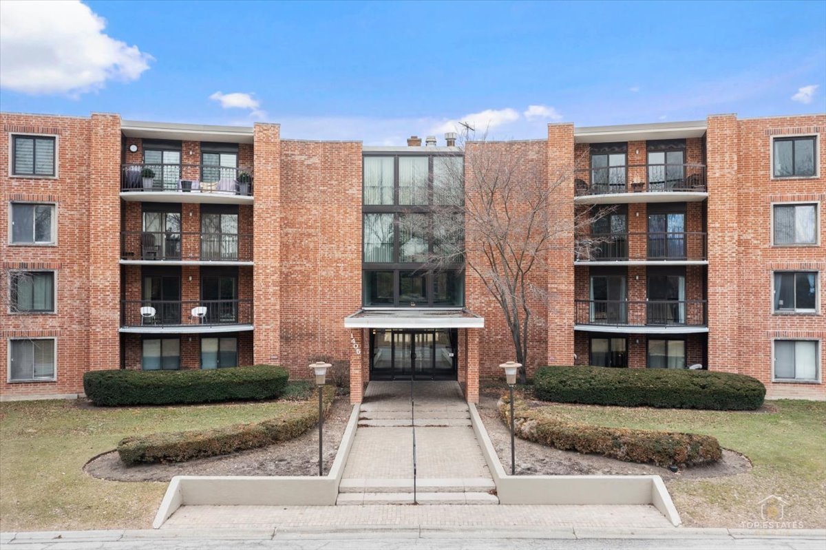 1405 East Central Road, Unit 222C Arlington Heights, IL 60005 - Photo 40 of 45 a view of building with outdoor space