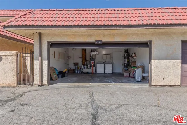 a view of room with wooden floor