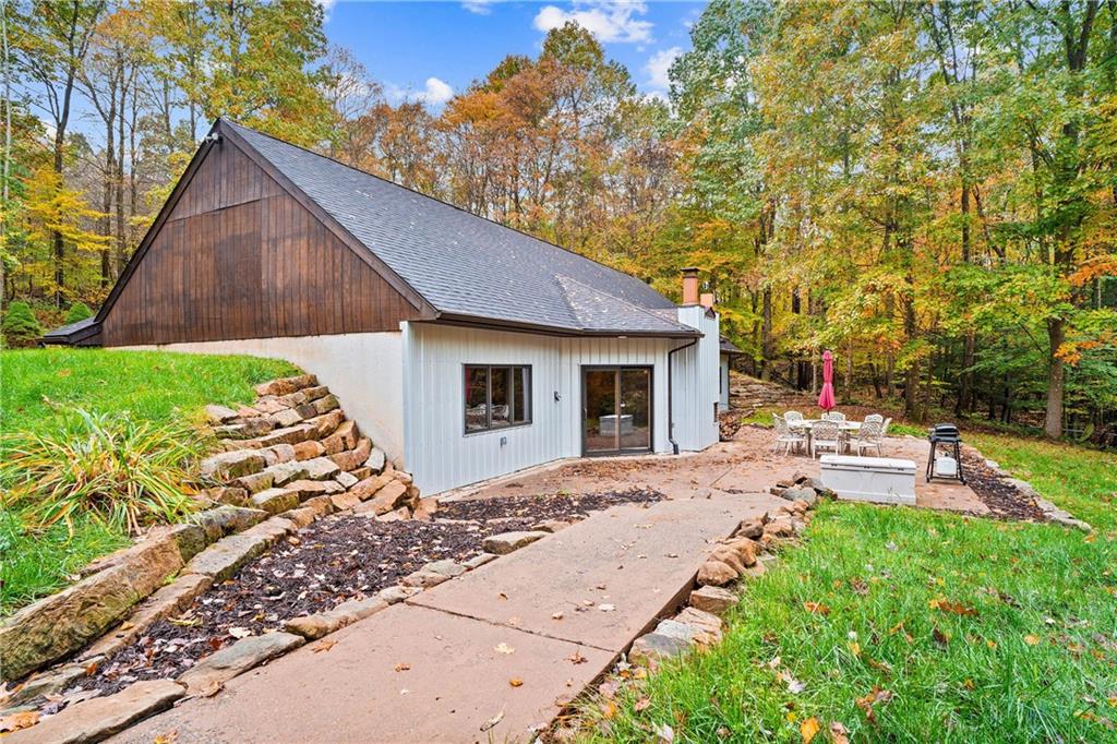 1850 Carter Road Volant, PA 16156 - Photo 2 of 23 a front view of a house with garden
