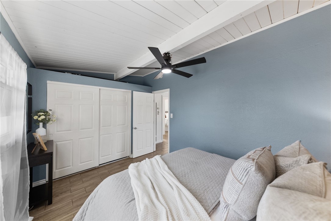 18018 East Armstead Street Azusa, CA 91702 - Photo 16 of 43 a bedroom with a bed and a ceiling fan