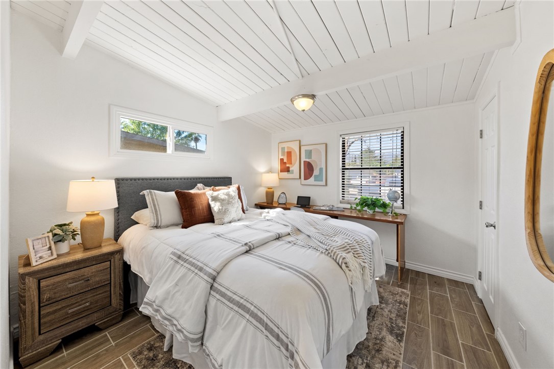 18018 East Armstead Street Azusa, CA 91702 - Photo 17 of 43 a bed room with a bed window and wall painting