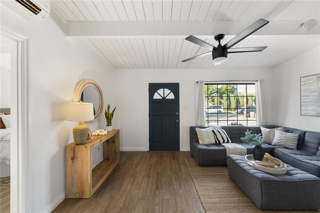 18018 East Armstead Street Azusa, CA 91702 - Photo 2 of 43 a living room with furniture and a large window
