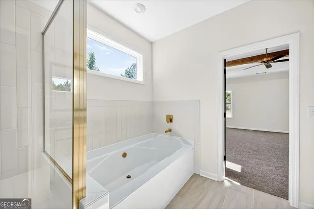 a bathroom with 2 sink and a mirror