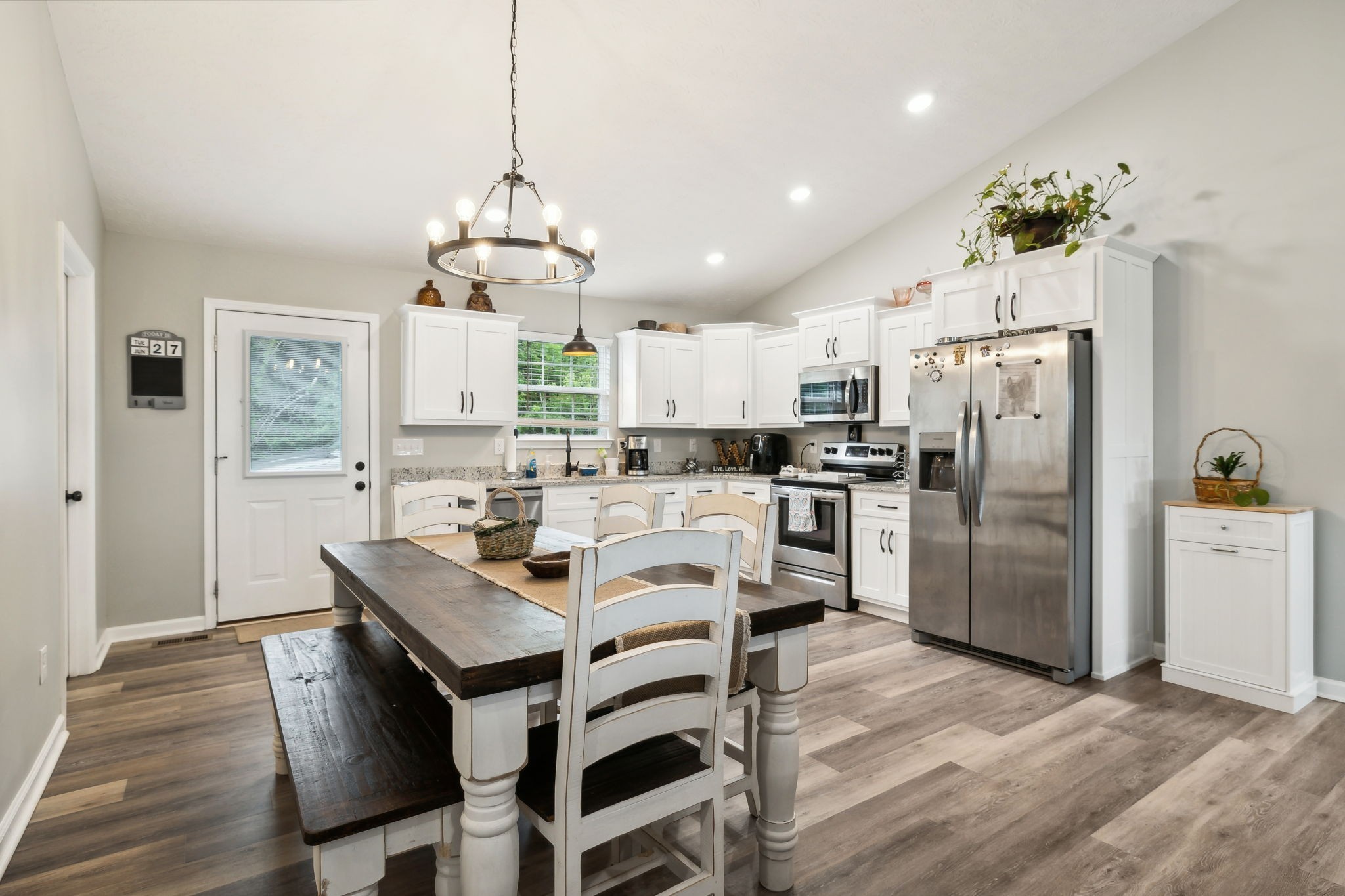 125 Vivian Lane Carthage, TN 37030 - Photo 11 of 29 a view of kitchen with refrigerator and wooden floor