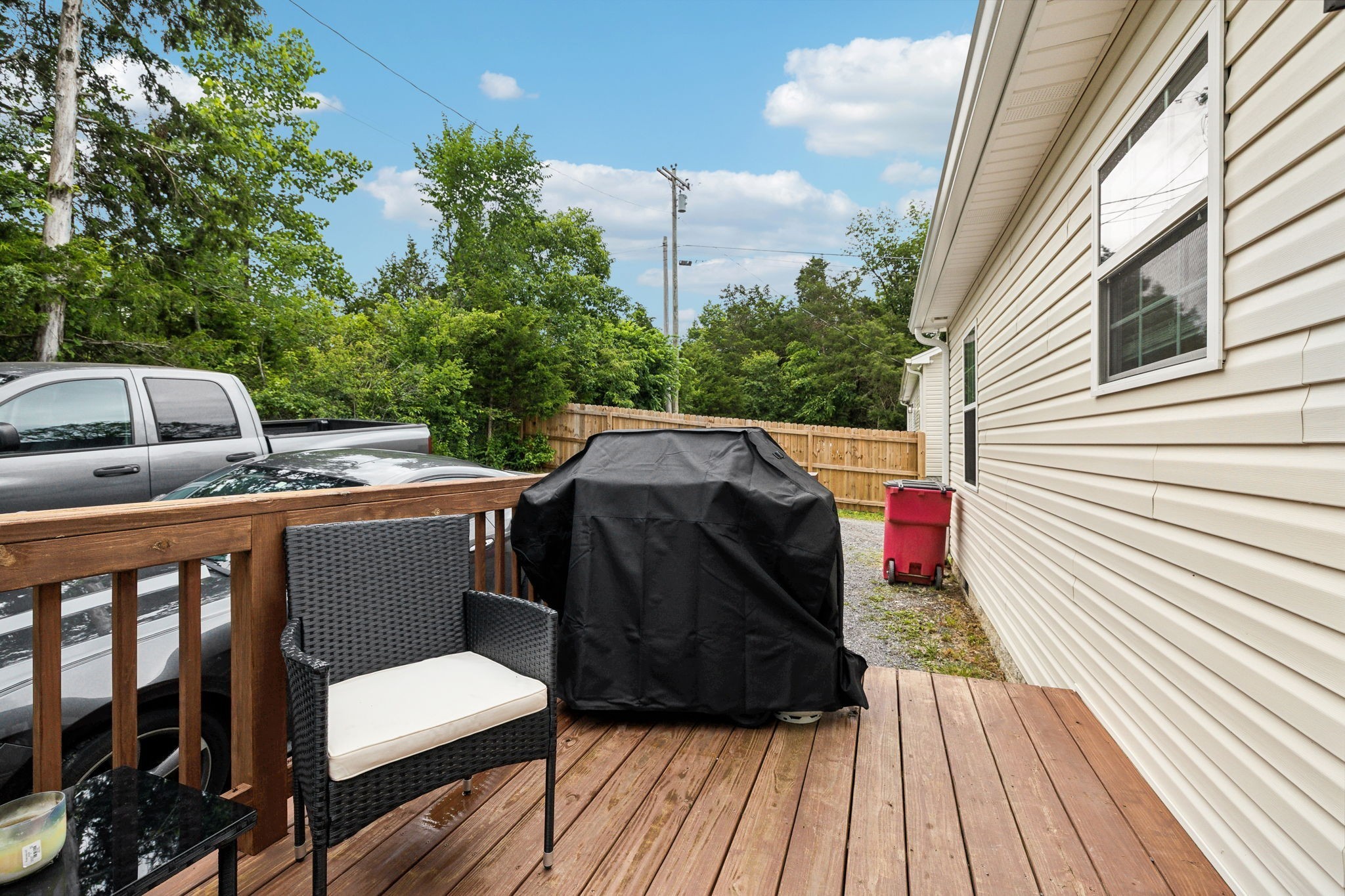 125 Vivian Lane Carthage, TN 37030 - Photo 25 of 29 a view of a roof deck with wooden floor and fence