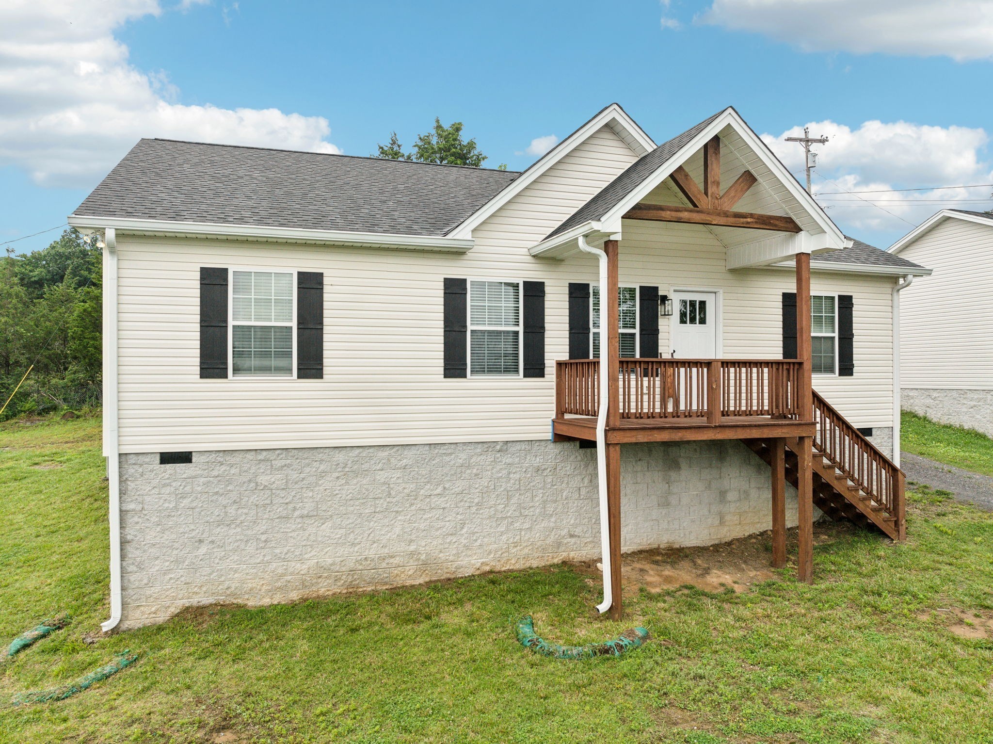 125 Vivian Lane Carthage, TN 37030 - Photo 3 of 29 a view of a house with a wooden fence