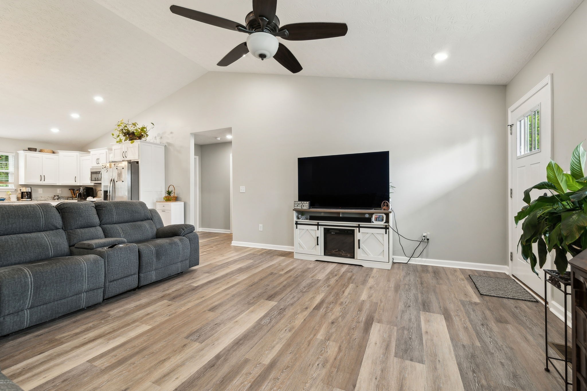 125 Vivian Lane Carthage, TN 37030 - Photo 7 of 29 a living room with furniture and a flat screen tv