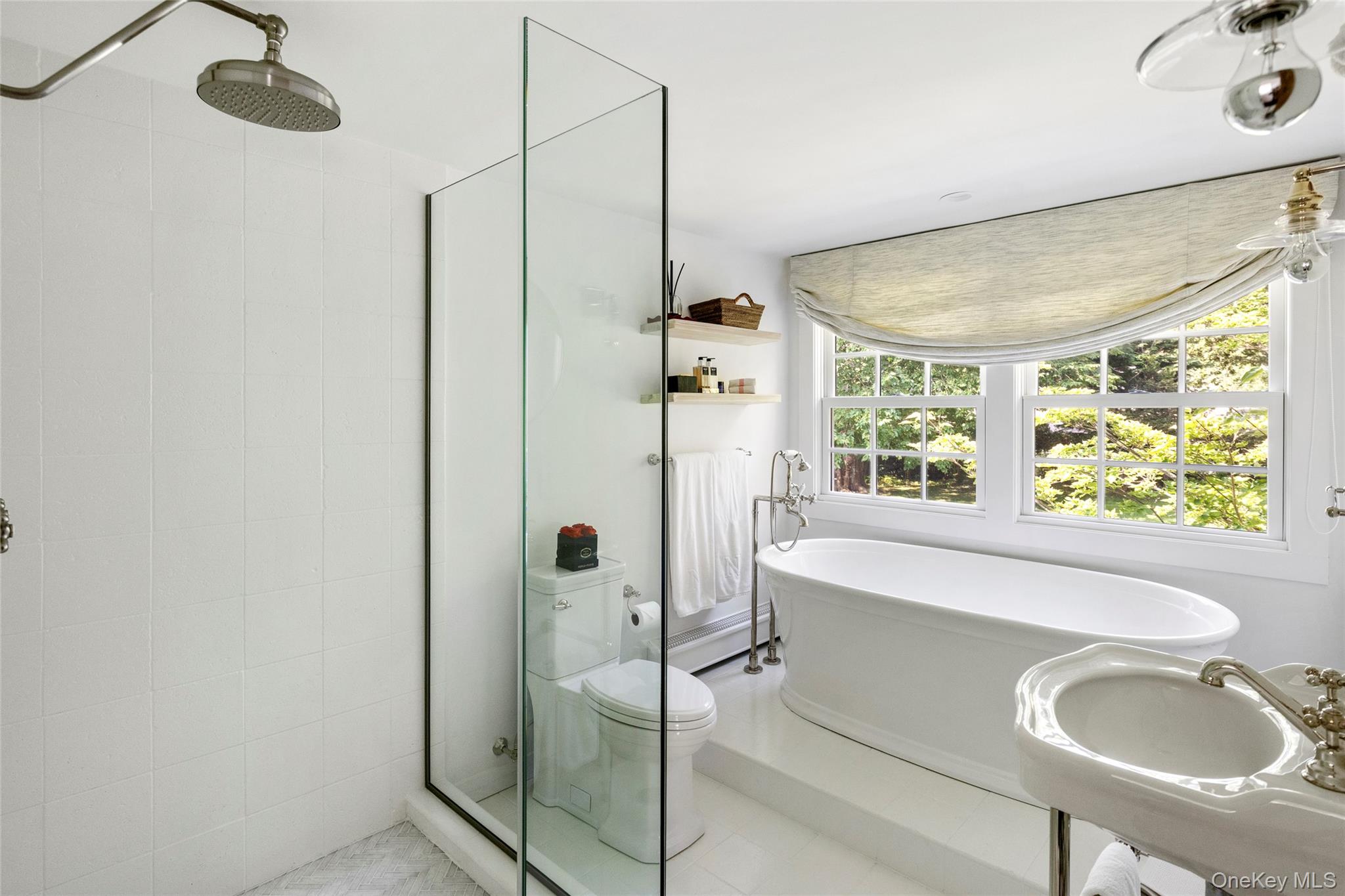 26 Ruxton Road East Hampton, NY 11937 - Photo 25 of 37 Full bathroom featuring a shower stall, a soaking tub, and tile patterned floors