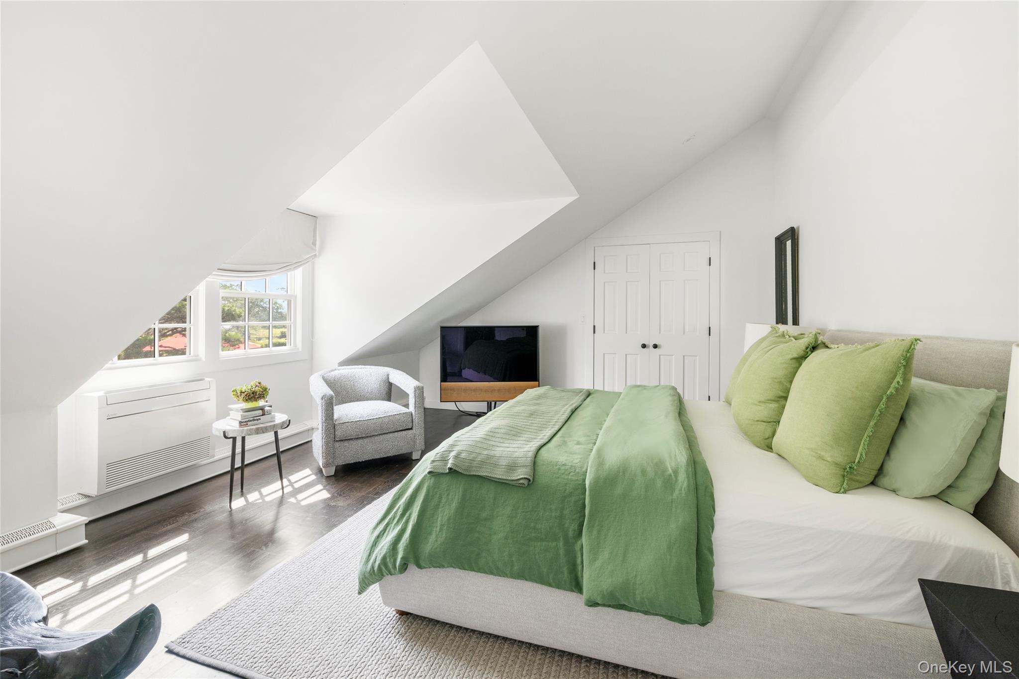 26 Ruxton Road East Hampton, NY 11937 - Photo 30 of 37 Second Floor Bedroom with vaulted ceiling, wood finished floors, and a closet