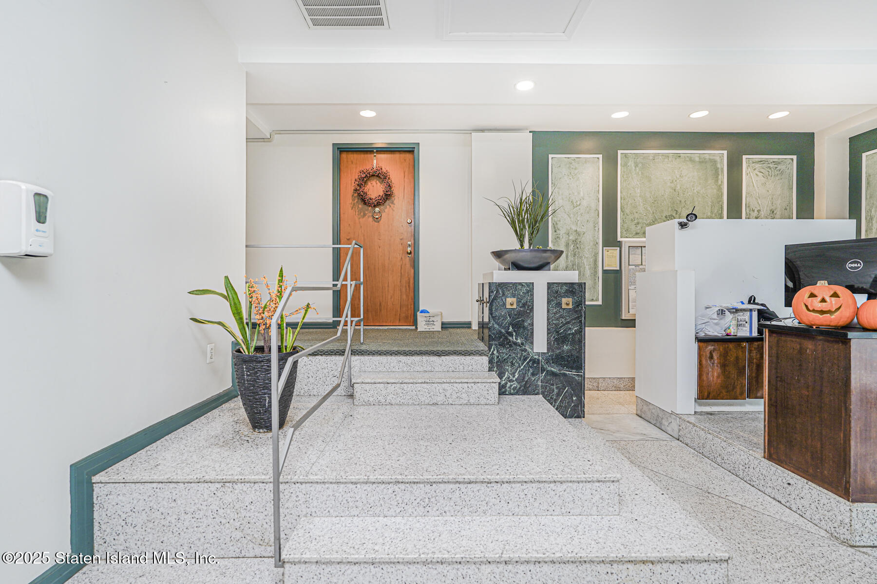 31 Hylan Boulevard, Unit 1B Staten Island, NY 10305 - Photo 5 of 23 a view of living room with furniture and a potted plant
