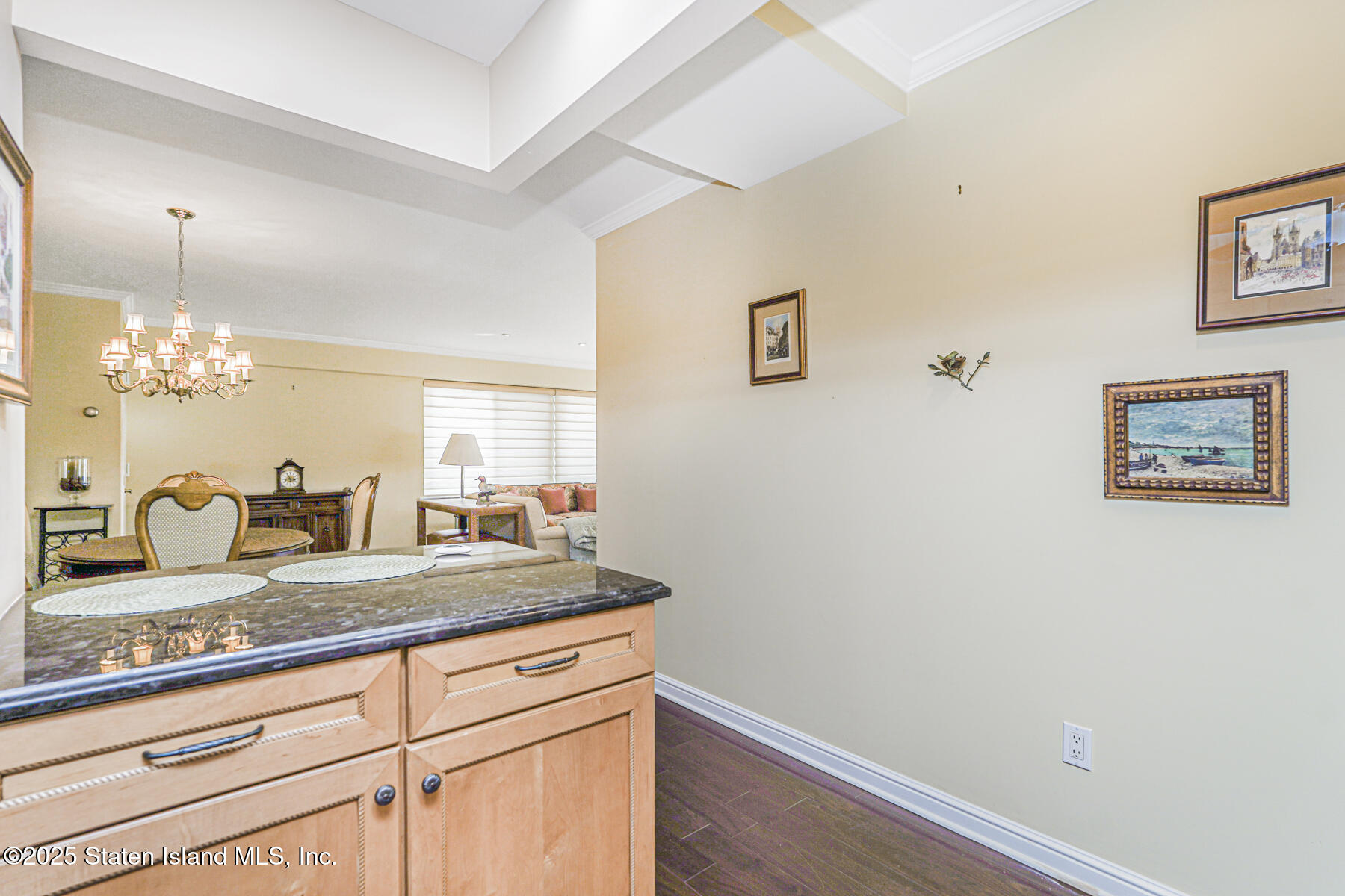 31 Hylan Boulevard, Unit 1B Staten Island, NY 10305 - Photo 8 of 23 a bathroom with a granite countertop sink and a mirror