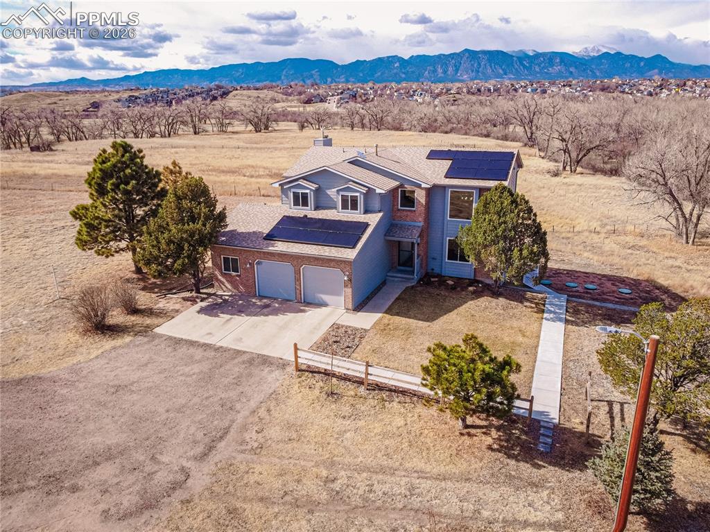 9110 Link Road Fountain, CO 80817 - Photo 1 of 47 a view of a terrace with a bench