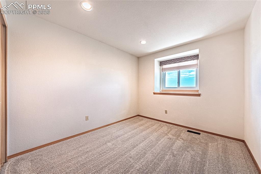 9110 Link Road Fountain, CO 80817 - Photo 26 of 47 an empty room with a window