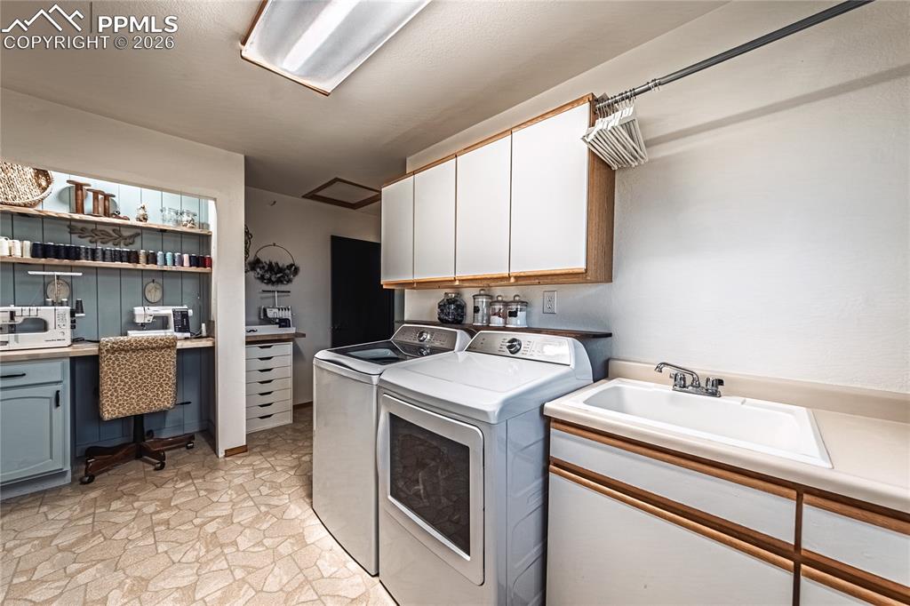 9110 Link Road Fountain, CO 80817 - Photo 28 of 47 a utility room with washer and dryer