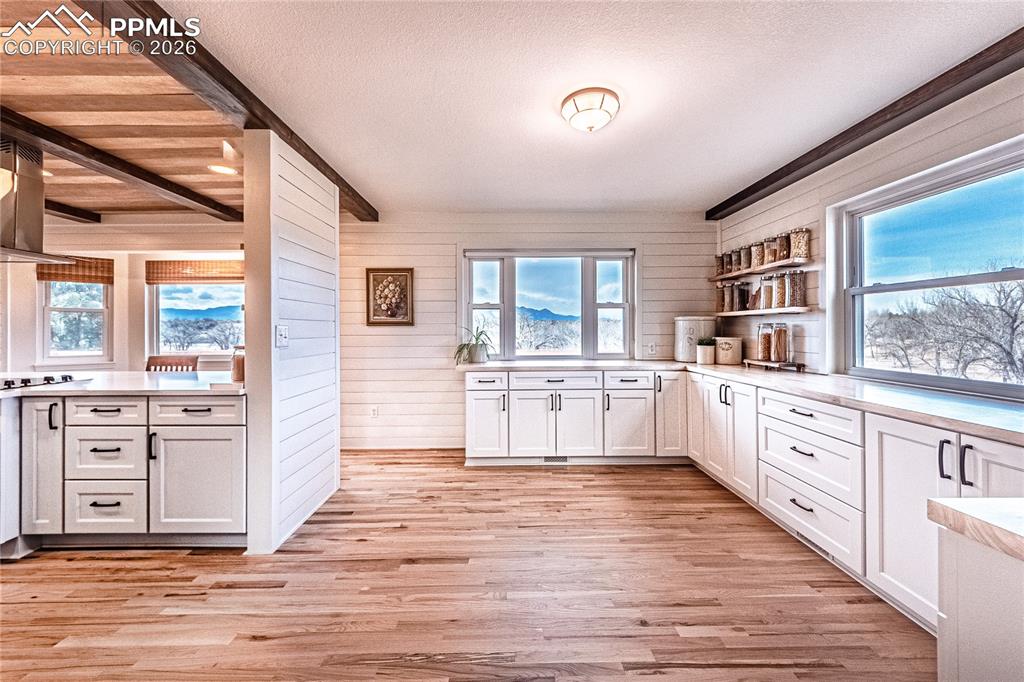 9110 Link Road Fountain, CO 80817 - Photo 6 of 47 a large kitchen with granite countertop a large counter top space a sink stainless steel appliances and cabinets