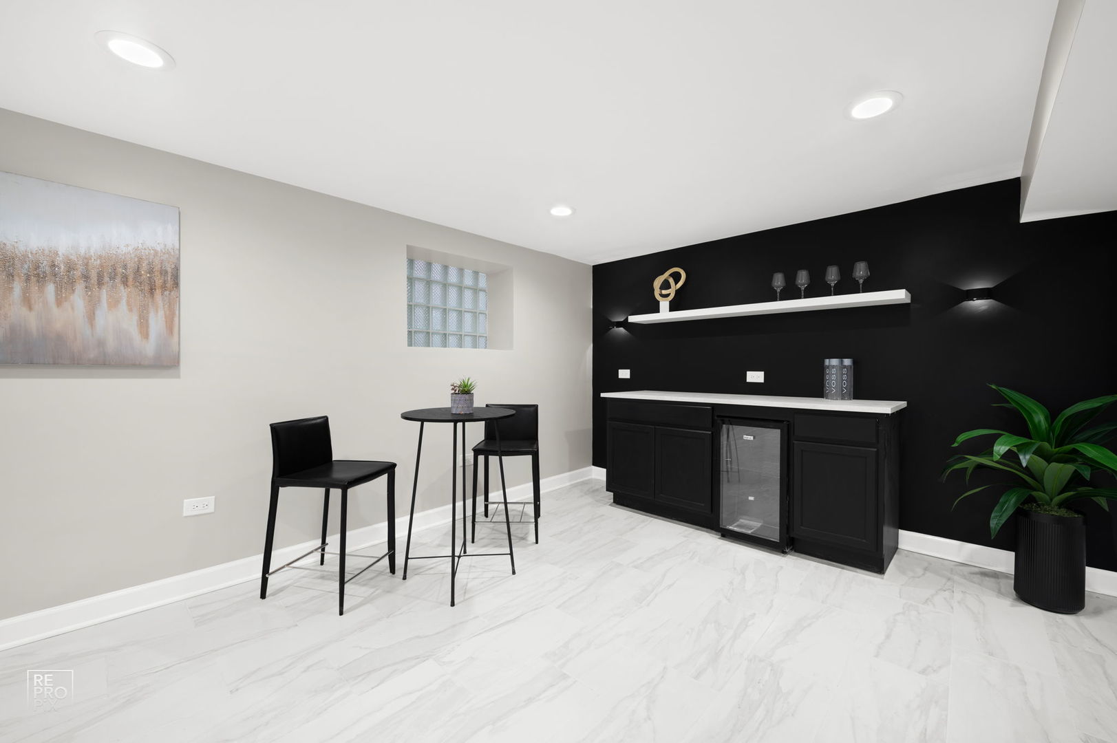 7425 South Vernon Avenue Chicago, IL 60619 - Photo 11 of 15 a workspace with furniture window and wooden floor