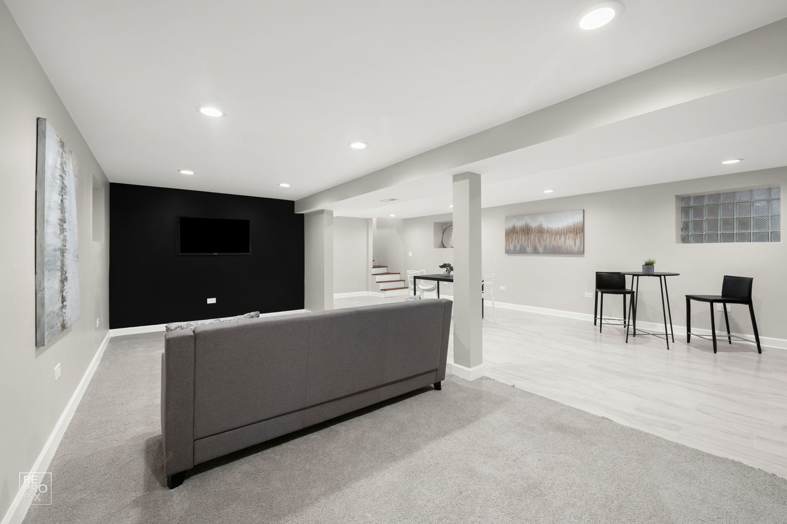 7425 South Vernon Avenue Chicago, IL 60619 - Photo 12 of 15 a living room with furniture and a flat screen tv