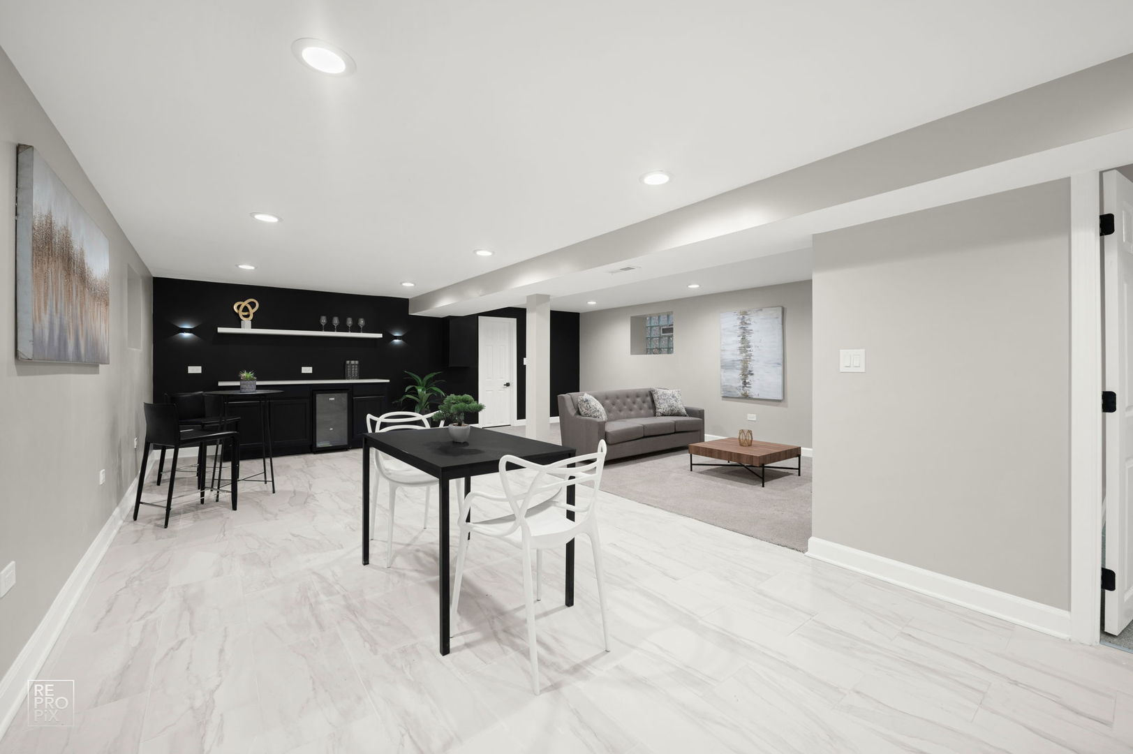 7425 South Vernon Avenue Chicago, IL 60619 - Photo 13 of 15 a living room with furniture and a wooden floor